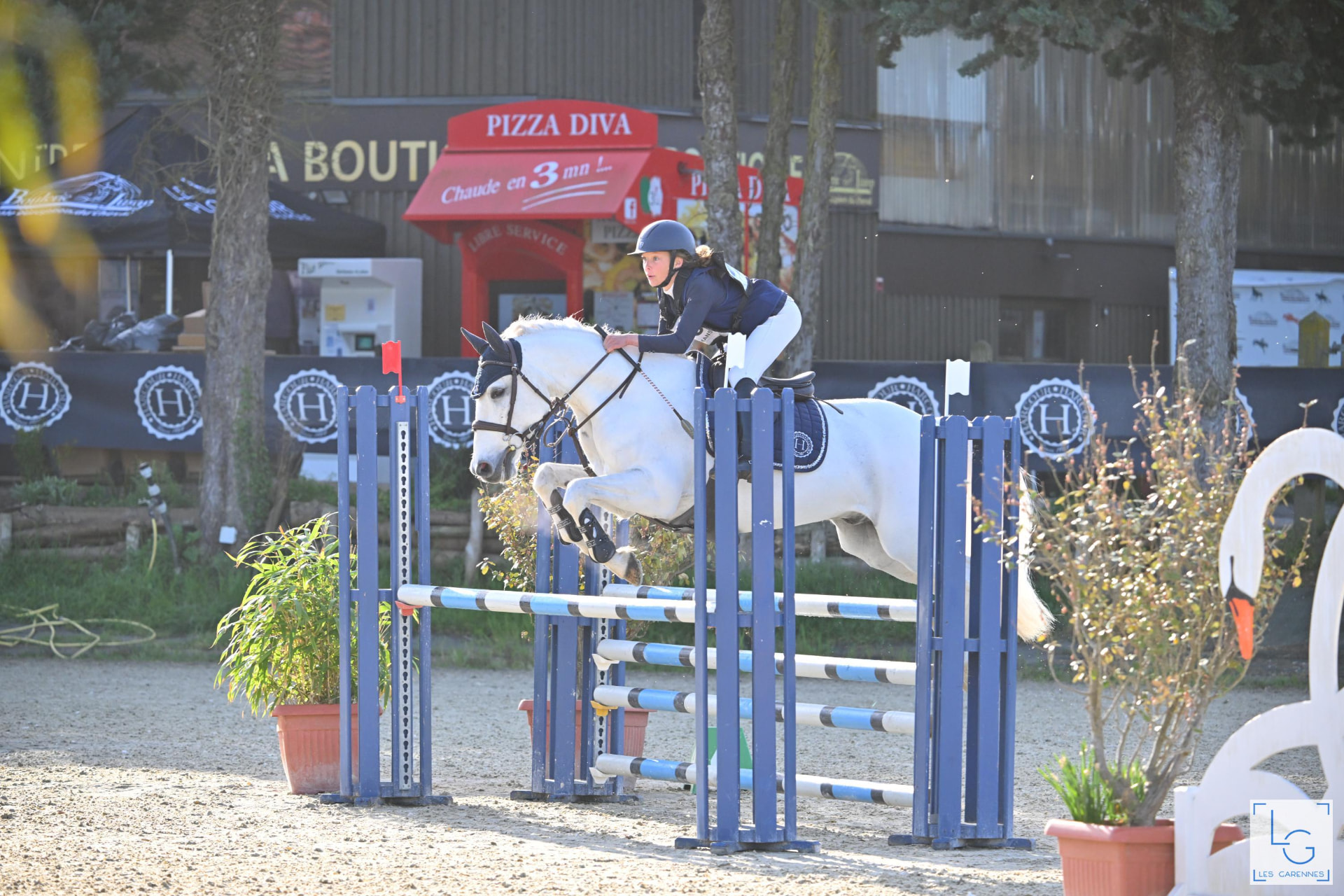 Saut d'obstacles en concours